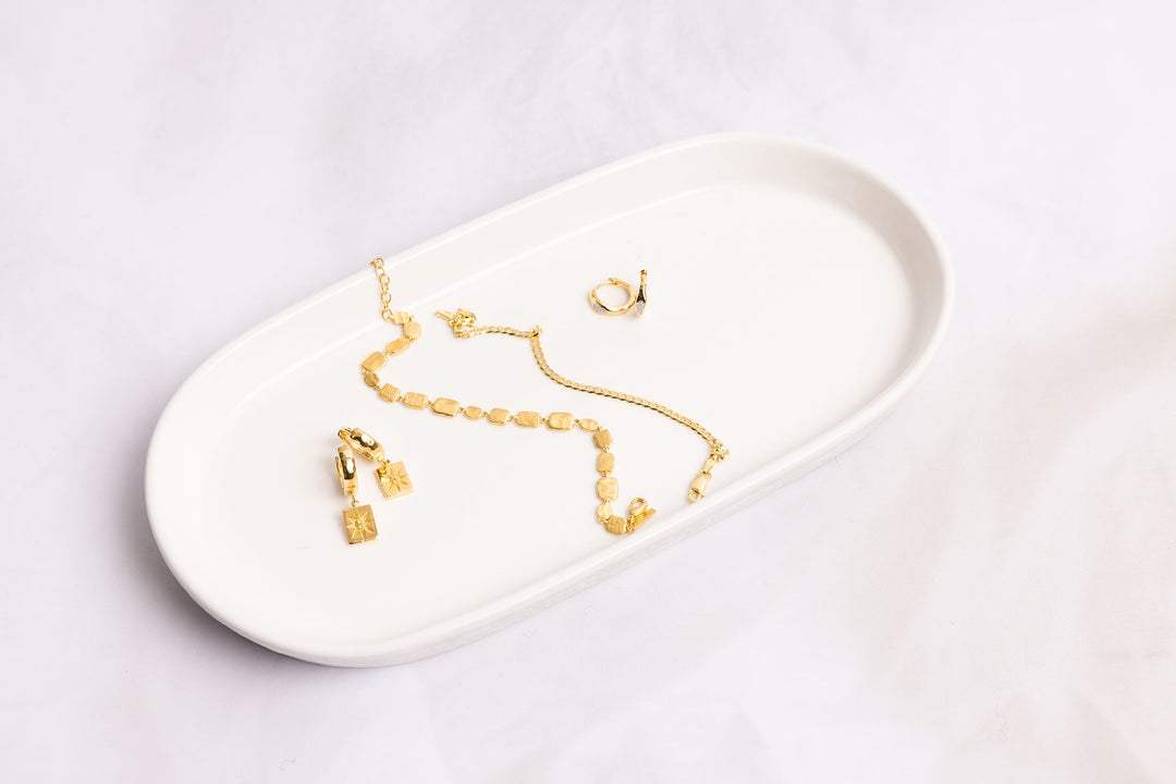 Feature image or bracelets and earrings to create your jewellery layering