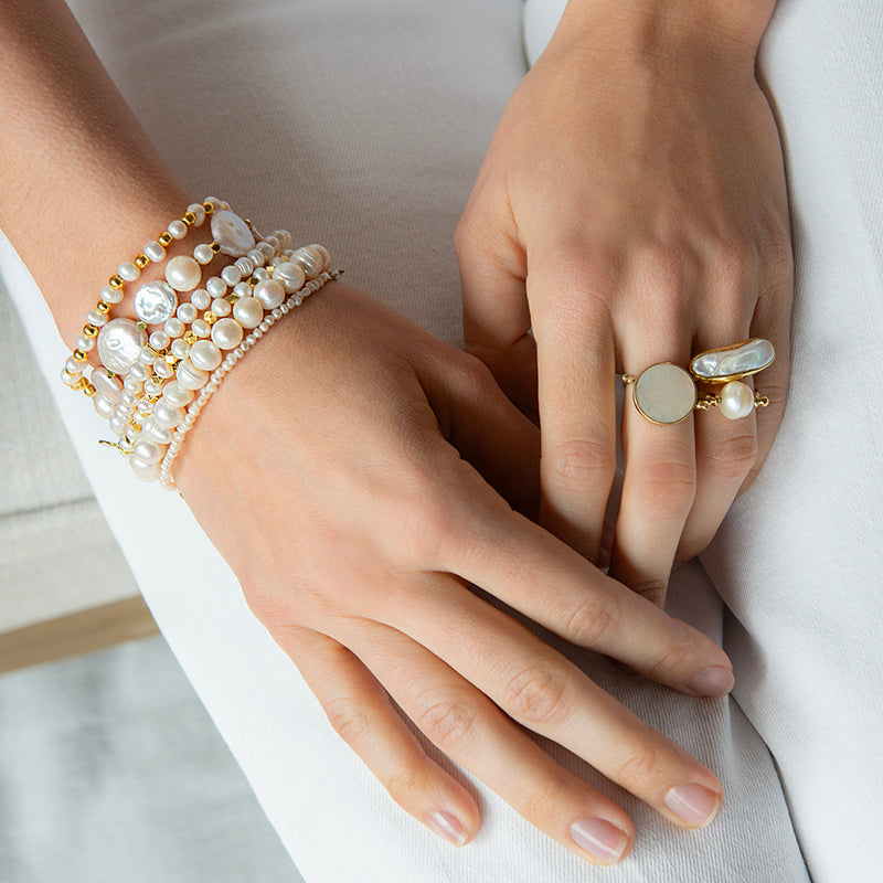 MOTHER OF PEARL EVIL EYE SPINNING RING