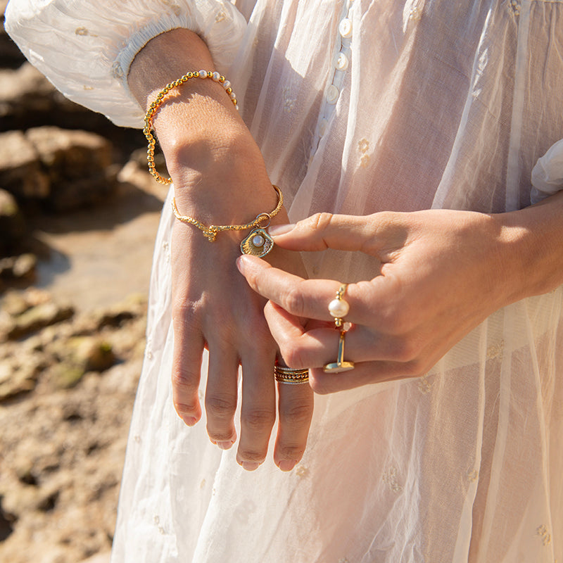 GIFT OF THE SEA SHELL CHARM