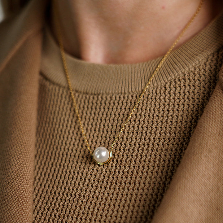 CRESCENT NINE-2-FIVE PEARL NECKLACE