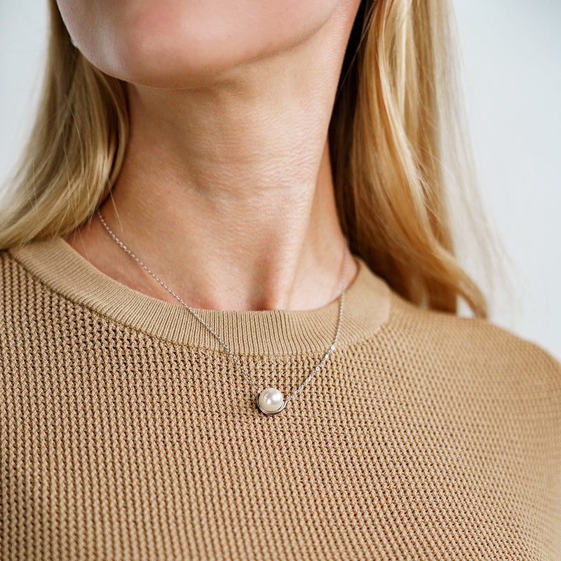 CRESCENT NINE-2-FIVE PEARL NECKLACE