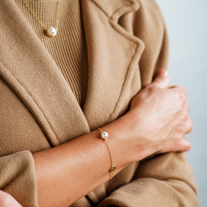 CRESCENT NINE-2-FIVE PEARL BRACELET