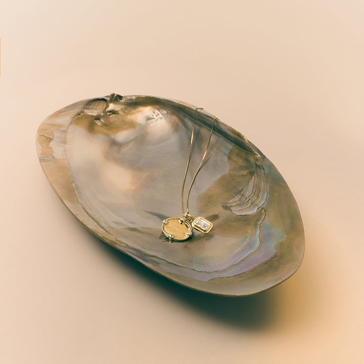 UNBOUND WHITE TOPAZ CHARM