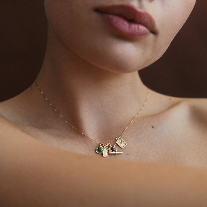 INTO THE FLOW MALACHITE CHARM