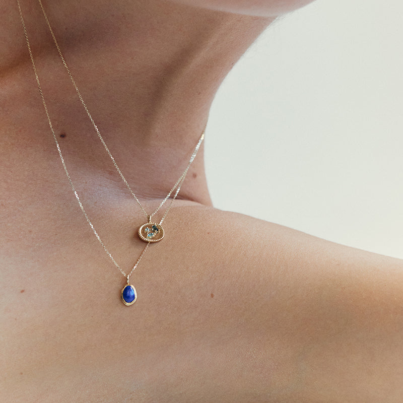 LUMINOUS LAPIS CHARM