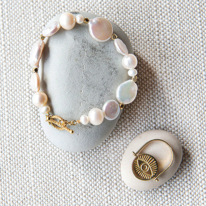 MOTHER OF PEARL EVIL EYE SPINNING RING