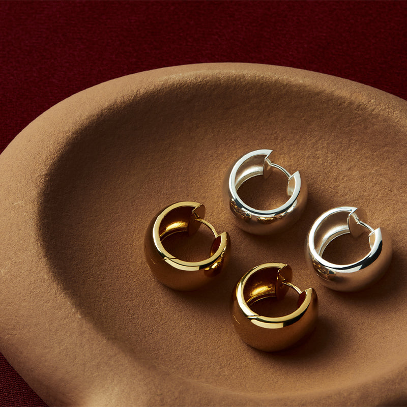 DAYNIGHT HUGGIE EARRINGS