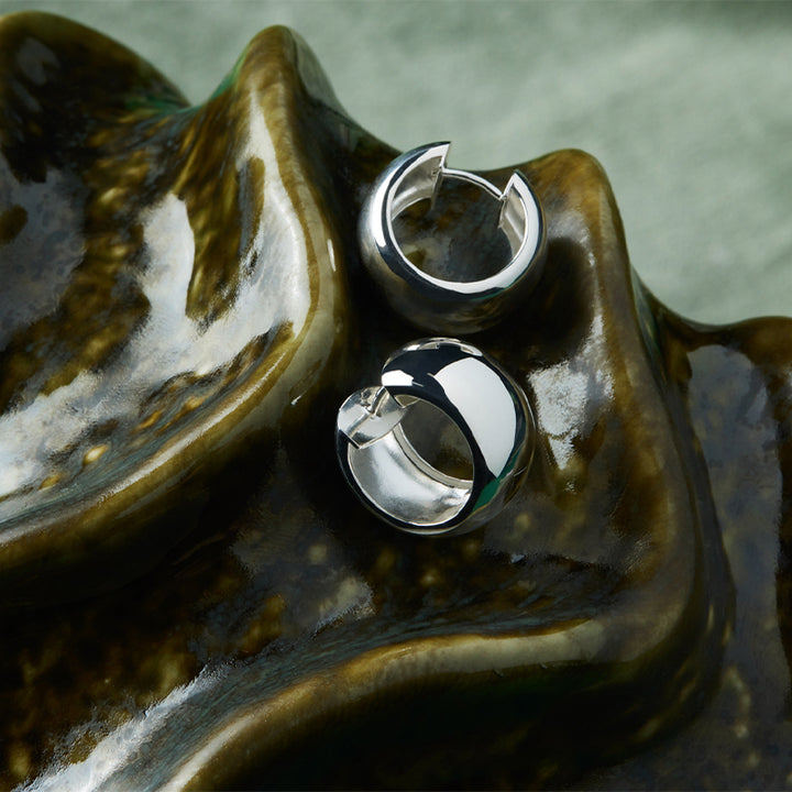 DAYNIGHT HUGGIE EARRINGS