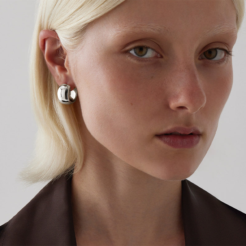 DAYNIGHT HUGGIE EARRINGS