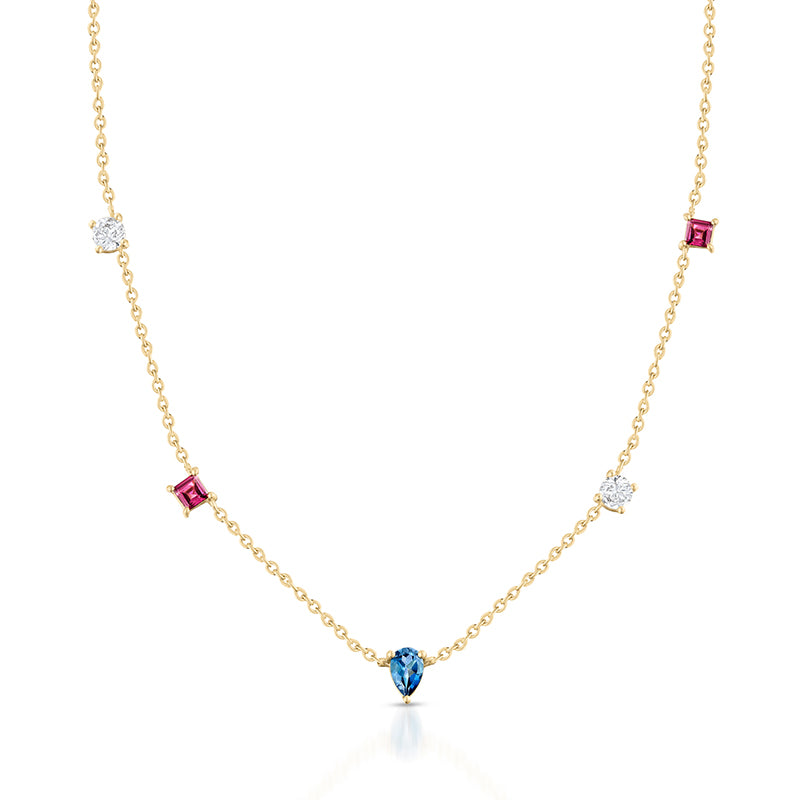 A delicate yellow gold necklace featuring a central pear-cut blue gemstone and four smaller accent stones in square and round settings, displayed on a clean white background.
