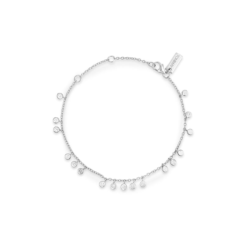 A delicate silver chain bracelet with multiple small dangling teardrop charms, photographed on a clean white background. A small tag on the clasp is engraved with the brand name 'TONIMAY'.