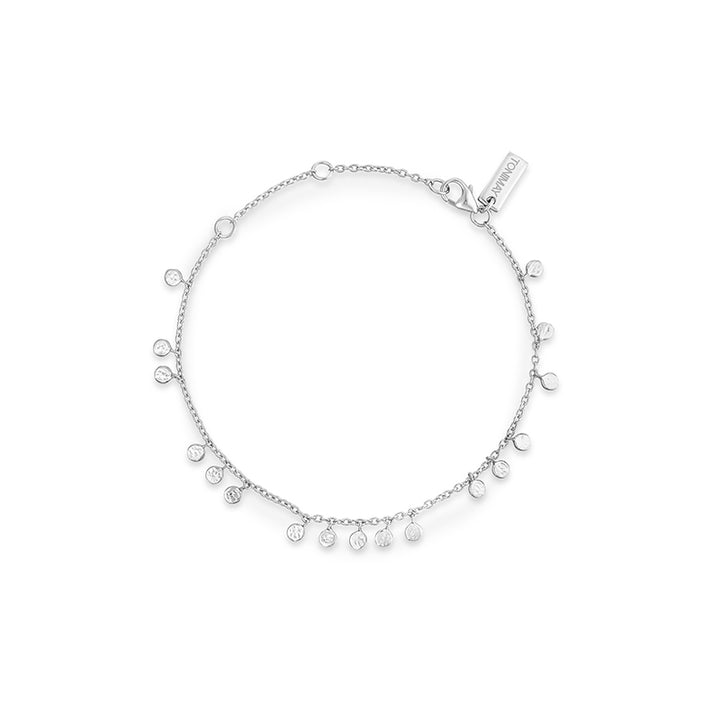 A delicate silver chain bracelet with multiple small dangling teardrop charms, photographed on a clean white background. A small tag on the clasp is engraved with the brand name 'TONIMAY'.