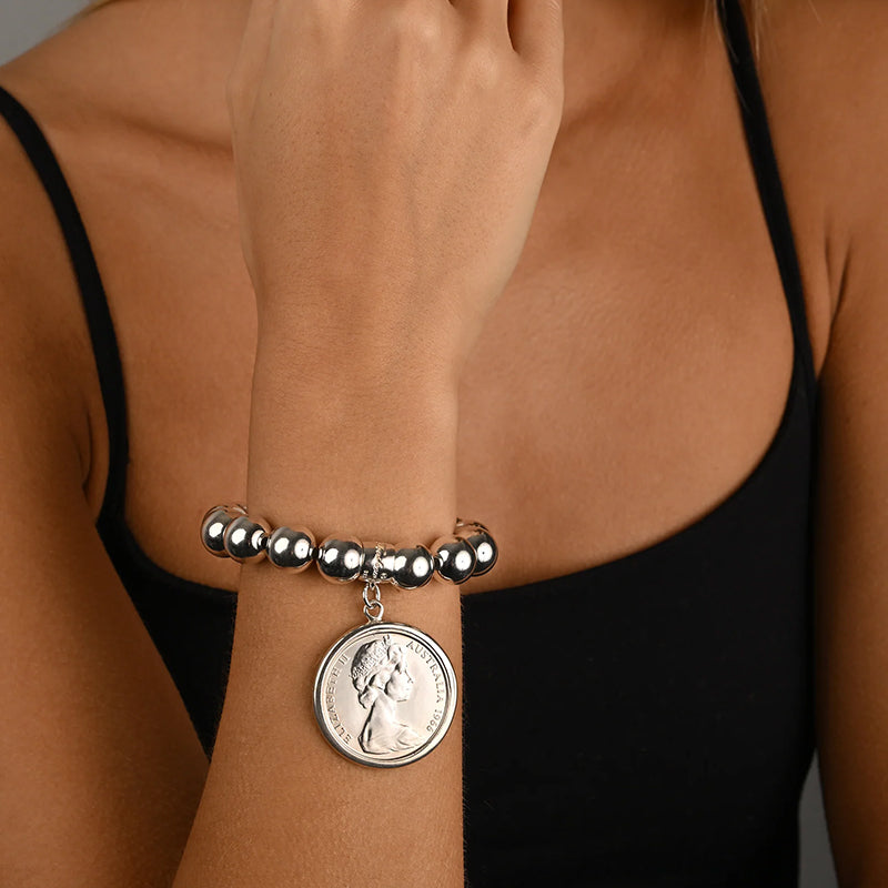 STRETCH BALL BRACELET WITH 1966 50C COIN