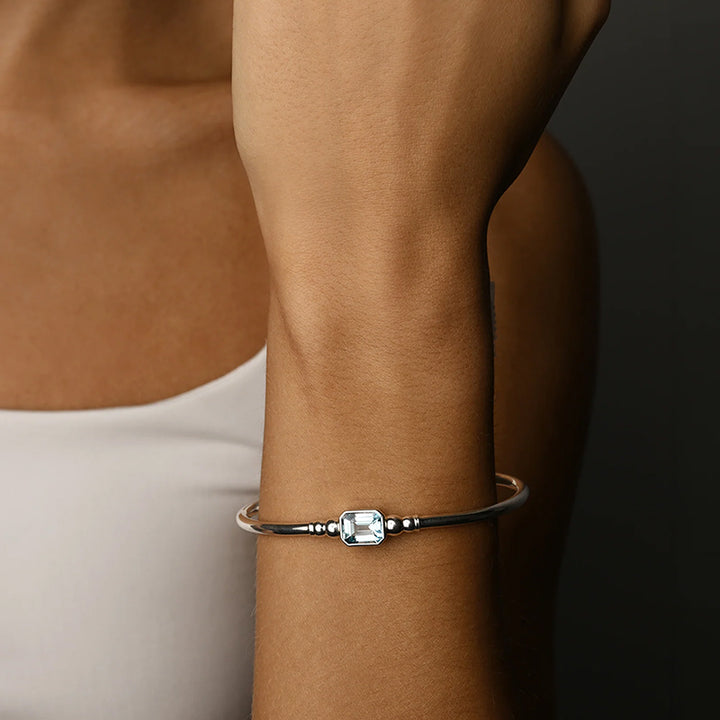 EMERALD CUT SKY BLUE TOPAZ BANGLE