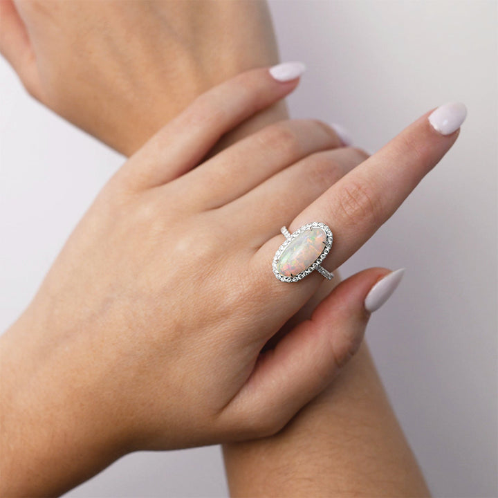 OVAL NATURAL OPAL AND DIAMOND RING